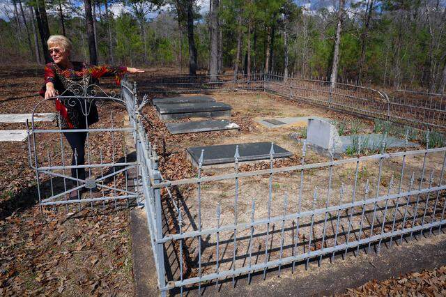 Debbie Jackson visits a family cemetery March 9, 2026, on her property in Muscogee County. Jackson lives near the proposed site for a hyperscale data center.