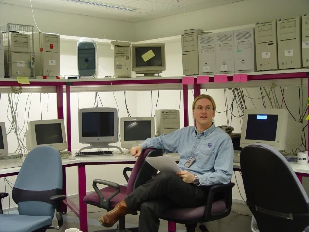 Mikko Hyppönen Jr. surrounded by computers.
