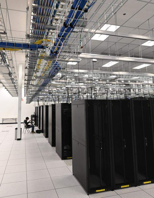 Jon Beard with Limestone Networks works on company hardware inside Segra’s CLT 2 data center near the airport on Oct. 27, 2025. Like other data center operators around the Charlotte region, Segra is expanding.